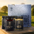 Jars of Manuka South honey and royal jelly with a branded box in the background.