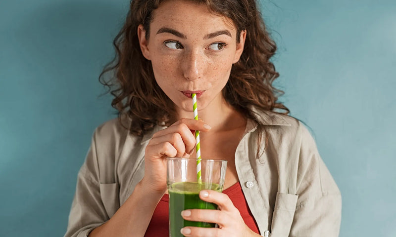 Girl drinking Manuka Honey Smoothie