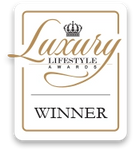 Award plaque for 'Luxury Lifestyle Awards Winner' with decorative elements.