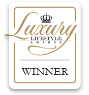 Award plaque for 'Luxury Lifestyle Awards Winner' with decorative elements.