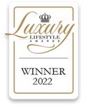 Luxury Lifestyle Awards 2022 winner badge with gold text and crown emblem.