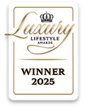 Award plaque for 'Luxury Lifestyle Awards Winner 2025' with gold text and a crown symbol.