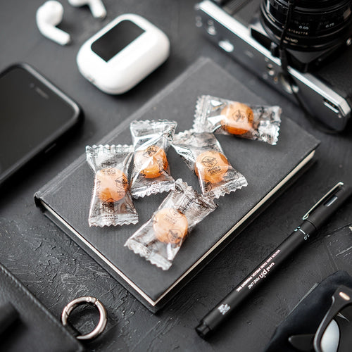 Manuka Honey drops lozenges on office desk