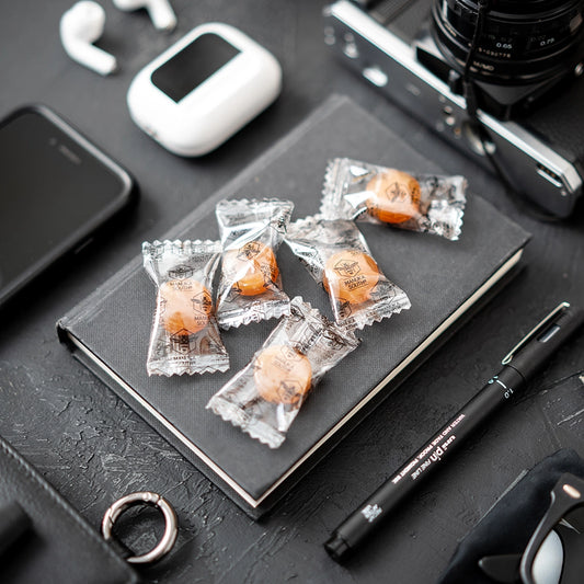 Manuka Honey drops lozenges on office desk